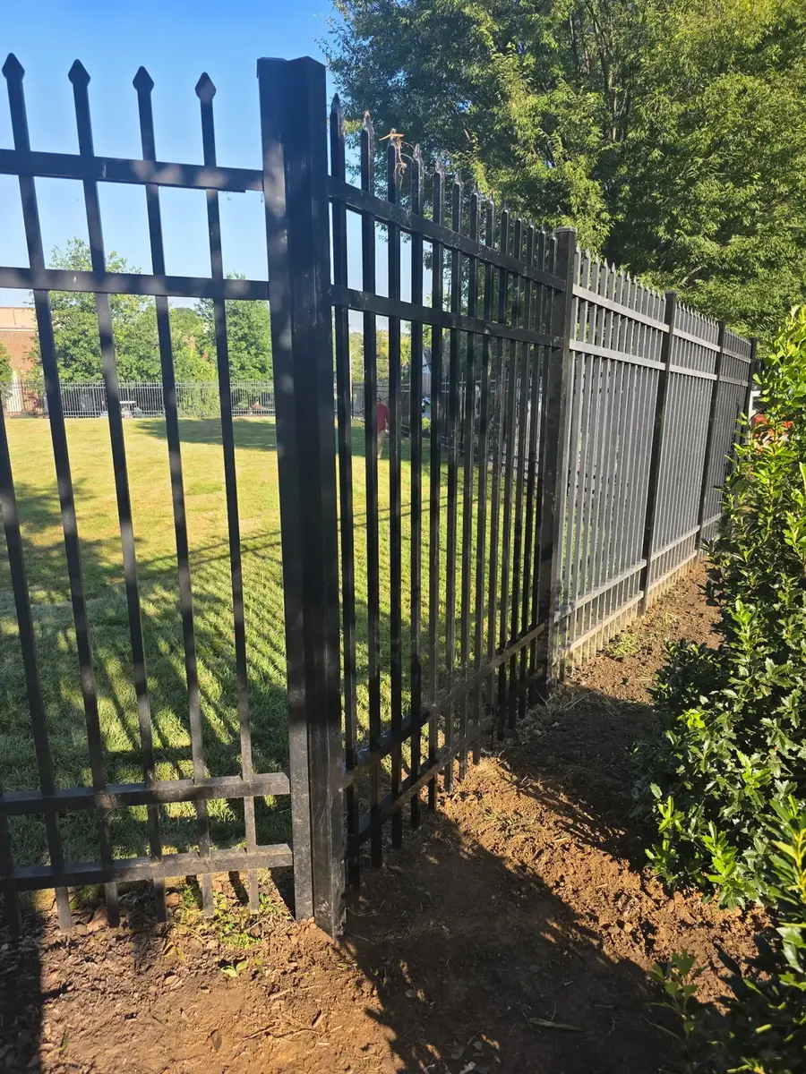 Black aluminum ornamental fence installation
